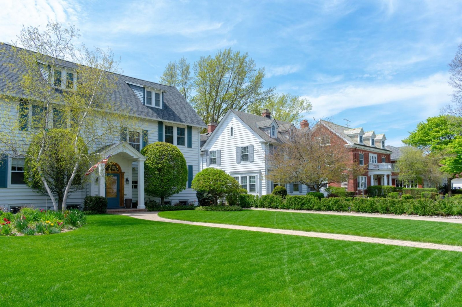 Freshly mowed lawn with garden beds