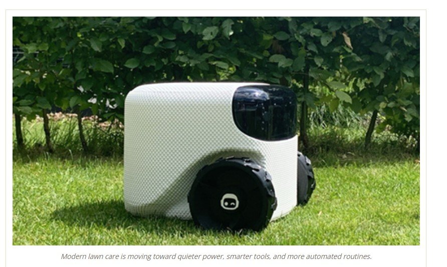 Modern robotic lawn mower operating on grass