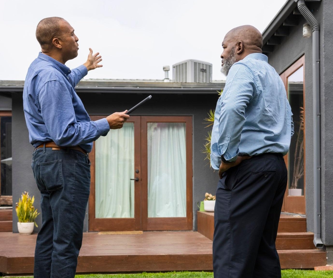 Homeowner consultation with contractor